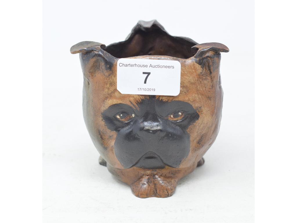 A three sided painted metal cat/dog/owl head ashtray, 9.5 cm high Modern reproduction piece. Good