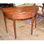 A George III inlaid mahogany D shaped card table, on tapering square legs, 97 cm wide