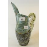 A Roger Cockram stoneware jug, of baluster form, with a seahorse handle, 31.5 cm high Report by GH