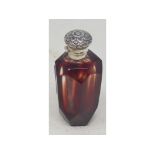 A silver coloured metal mounted coloured glass scent bottle, 7 cm high Modern