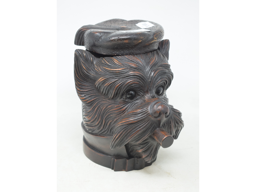 A carved wood tobacco jar, in the form of a dog's head, 18 cm high Modern