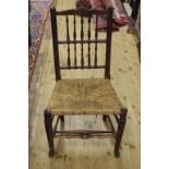 A set of six country made spindle back chairs, with rush seats (6)