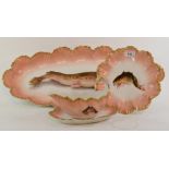 A Limoges porcelain fish service, comprising a pair of fish dishes, 62 cm wide, fifteen plates,