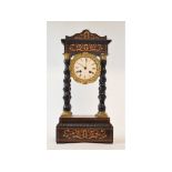 A late 19th century French portico clock, the 8.5 cm enamel dial with Roman numerals, fitted an
