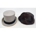 A top hat, a mink hat, a hat box, and twelve assorted mink stoles (qty)