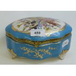 A Sevres style porcelain box, decorated musical instruments, 20 cm wide