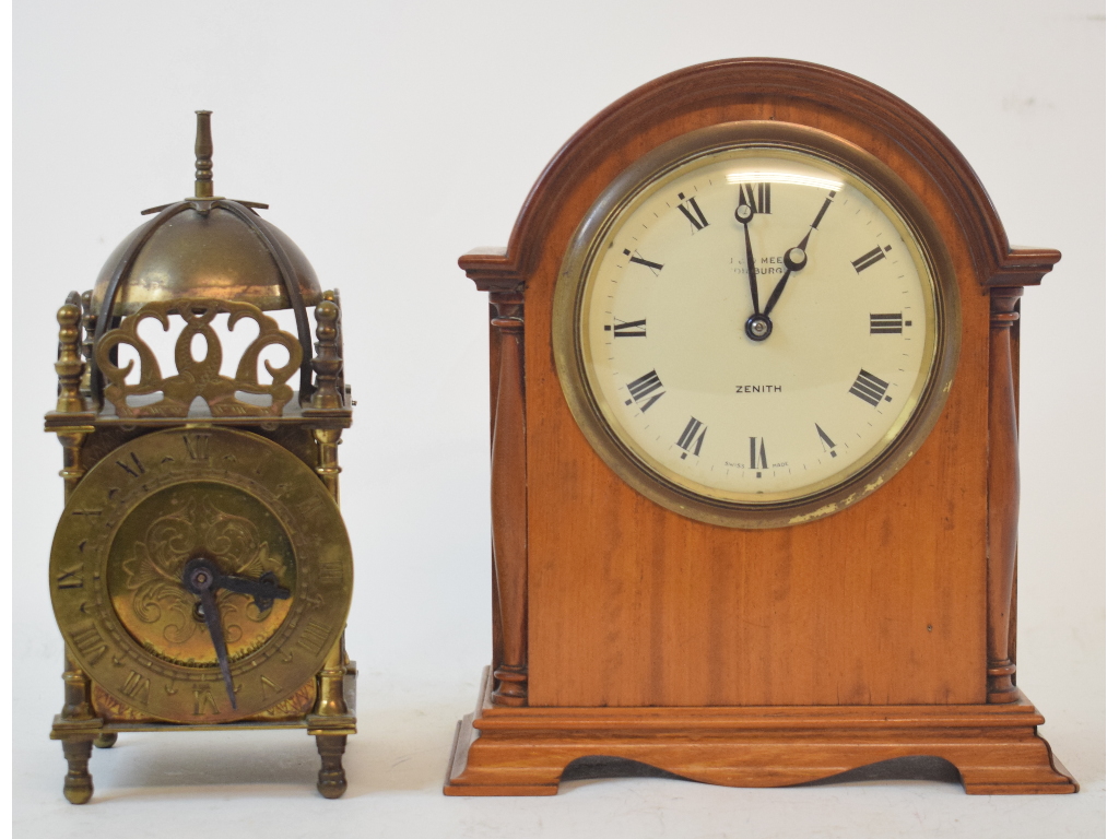 An early 20th century mantel clock, the 8.5 cm enamel dial with Roman numerals and signed Zenith, in