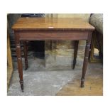 A Victorian mahogany writing table, on turned legs, 76 cm wide