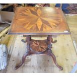 A mahogany occasional table, having a wood specimen inlaid top and undertier, on down-swept legs, 71