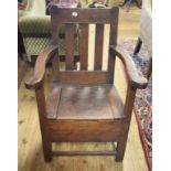 A 19th century oak chair, with a box base