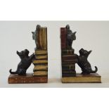 A pair of painted bronze cat and dog bookends, 14 cm high (2)