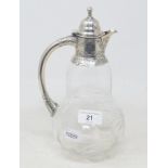A cut glass claret jug, the silver mounts Birmingham 1898, 25 cm high