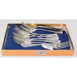 A set of eleven old English pattern table forks, crested to match, various dates and makers, approx.