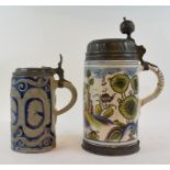 A 19th century German polychrome faience stein, with pewter mounts, handle glued, 26 cm high, and