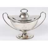 A George III style silver soup tureen and cover, crested and with a motto, of navette form, with
