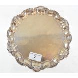 An 18th century style silver salver, on claw and ball feet, London 1923, approx. 11.9 ozt, 21.5 cm