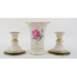 A Meissen porcelain vase, decorated roses, 14 cm high, and a pair of Hutchenreuther porcelain