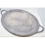 A late Victorian silver plated oval tea tray, crested within a garter, and with engraved decoration,