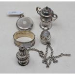 Three silver pepperettes, a silver napkin ring, a silver Albert, approx. 4.4 ozt, and an open face