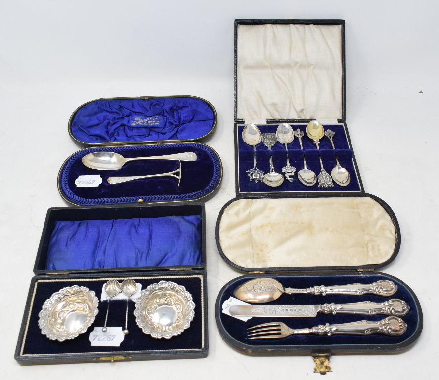 A pair of silver salts, Birmingham 1915, with a pair of associated silver spoons, cased, and other