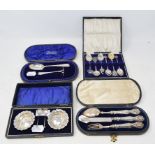 A pair of silver salts, Birmingham 1915, with a pair of associated silver spoons, cased, and other