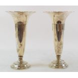 A pair of silver spill vases, marks rubbed, approx. 8.9 ozt, 18 cm high