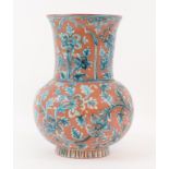 A Middle Eastern painted pottery vase, decorated flowers and foliage, 21.5 cm high Report by GH