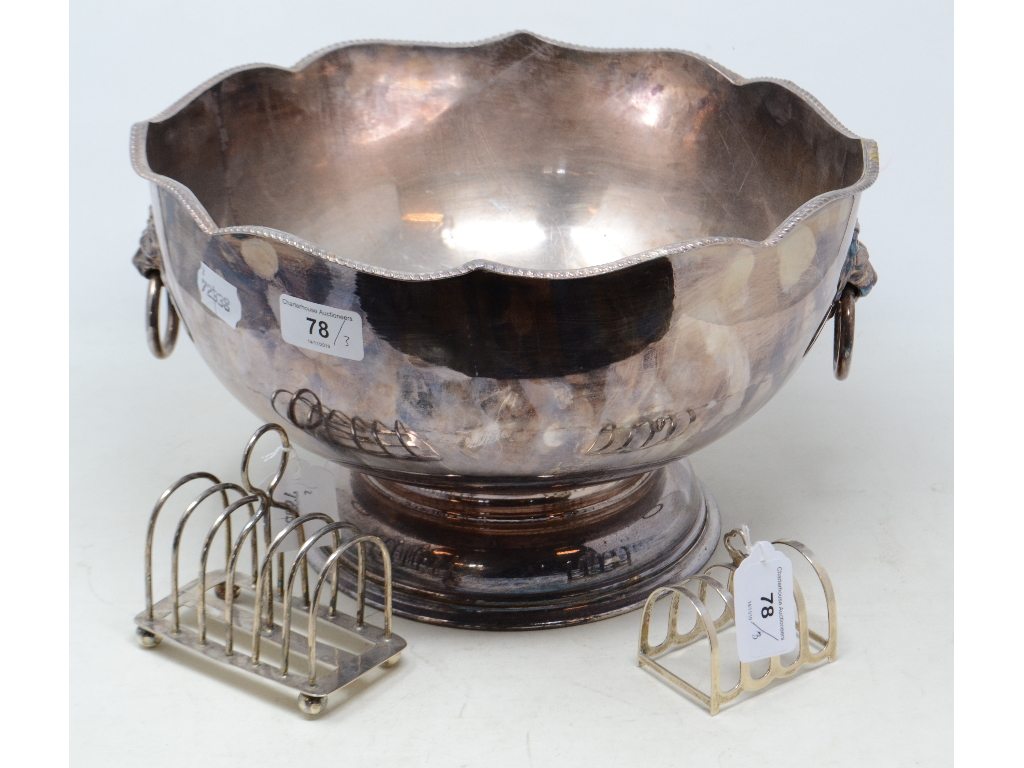 EXTRA LOT: Two silver toast racks, approx. 5.3 ozt, and a silver plated punch bowl, with a case (3)