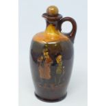 A Royal Doulton Kingsware Gillie and the Fisherman jug and stopper, BL Scotch Whisky, some