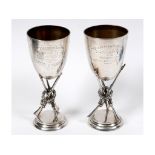 An unusual matched pair of silver shooting trophies, 7th Dragoon Guards Shooting Club .... and 7th