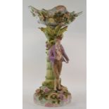 A late 19th century Dresden porcelain comport, the base applied a young man, and encrusted with