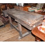 An early 20th century work bench, with vice, 200 cm wide