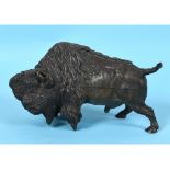 A late 19th/early 20 century Austrian style cold-painted bronze figure, of a bison, 19.5 cm long See