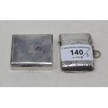 A silver vesta case, Birmingham 1902, and a small silver razor box, crested (2)