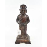 A Chinese copper alloy figure, traces of gilding, 31 cm high