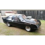 A 1980 Ford Escort RS2000 dragster, registration number RGT 520V, black. This magazine featured