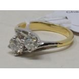 An 18ct gold and two stone diamond fancy crossover ring, diamonds approx. 2.37ct, approx. ring