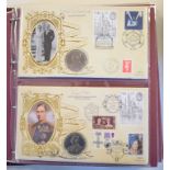 An album of philatelic numismatic covers, some signed