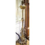 A late Victorian telescopic brass standard oil lamp, decorated acanthus leaves, the reeded column on