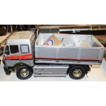A Mercedes-Benz tipper lorry, 1838, a Tamiya semi-trailer, and Esso petrol tanker (the wheels for