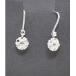 A pair of 18ct gold and diamond daisy drop earrings