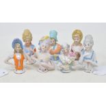 Seven porcelain half dolls, the tallest 8 cm (7)