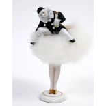 A porcelain half doll powder puff assembly, Pierrot and Pierrette, 21.5 cm high, and another