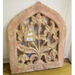 A Mughal sandstone panel, of lancet form, with floral decoration, 41 cm wide