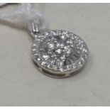 An 18ct white gold, baguette cut and brilliant cut diamond pendant, diamonds approx. 0.46ct