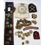 Assorted military buttons, pips, badges and other items