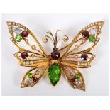 An early 20th century 9ct gold, seed pearl and semi precious stone butterfly brooch, 5.5 cm wide,