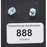 A pair of silver and blue topaz stud earrings, boxed