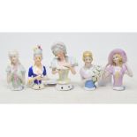 Five porcelain half dolls, the tallest 10.5 cm (5)
