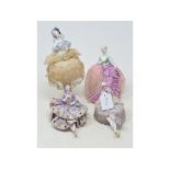 A porcelain half doll assembly, flapper with lilac hat and jacket, fabric dress with card suits,